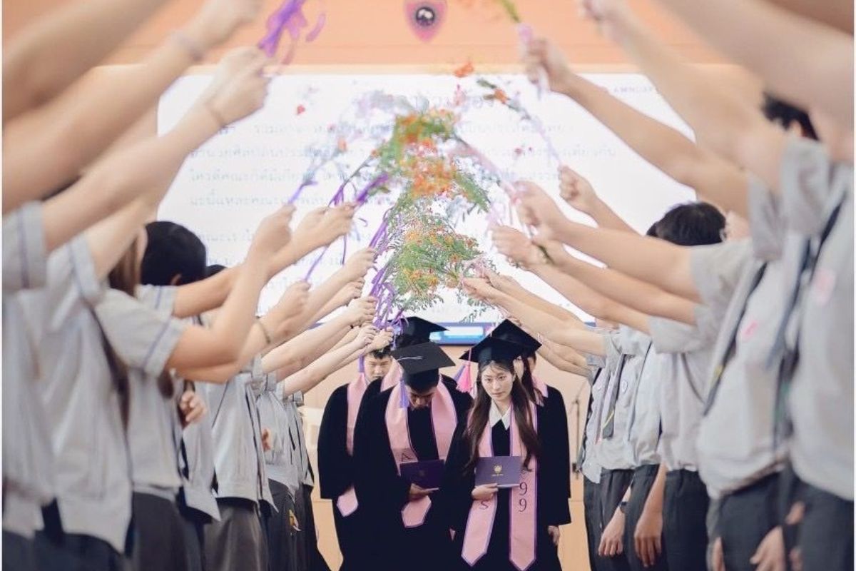 Class of graduating seniors at Amnuay Silpa School during commencement ceremony