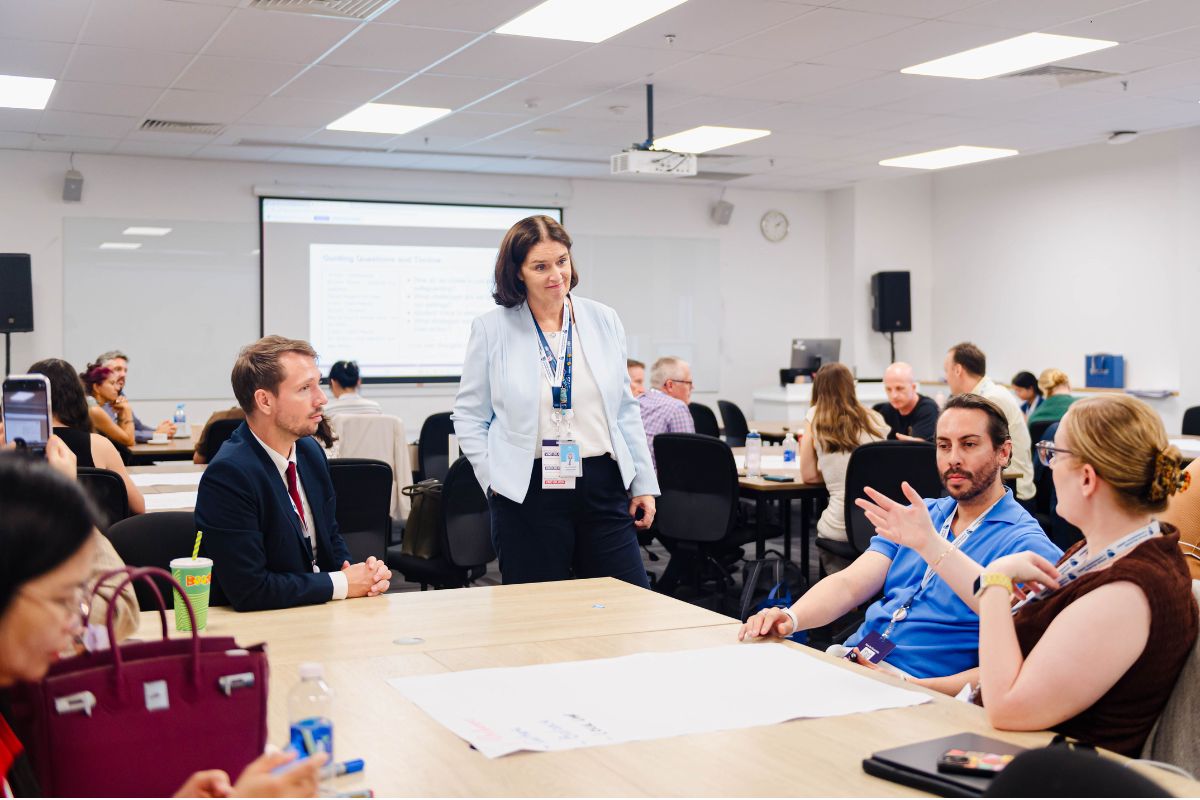 Deirdre Grimshaw engaging with staff demonstrating trust and servant leadership