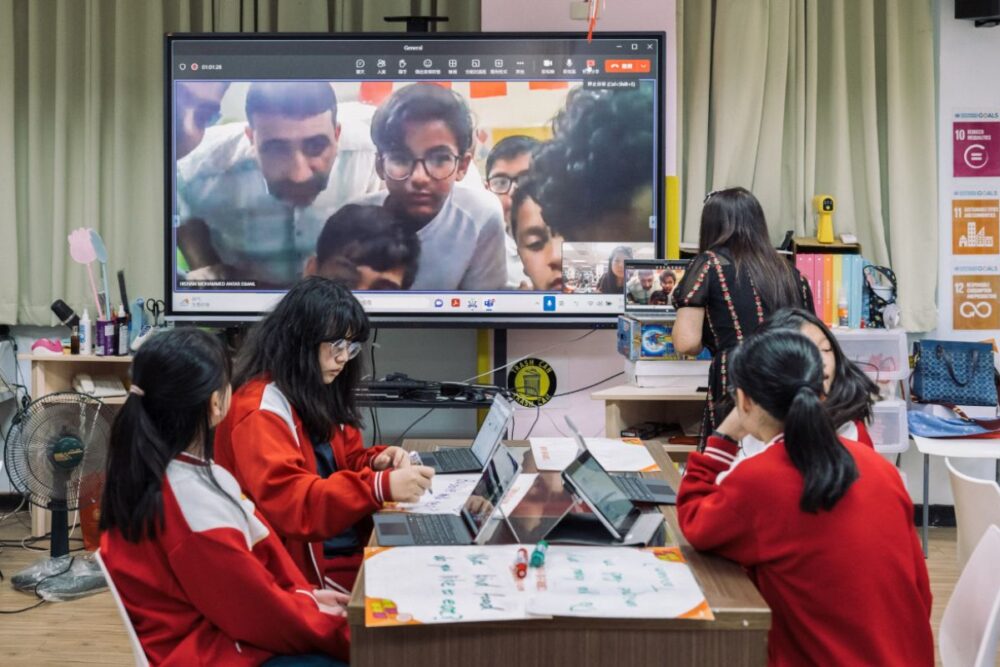 Students in China engage with AI-powered tools in a smart classroom environment designed for personalised learning.