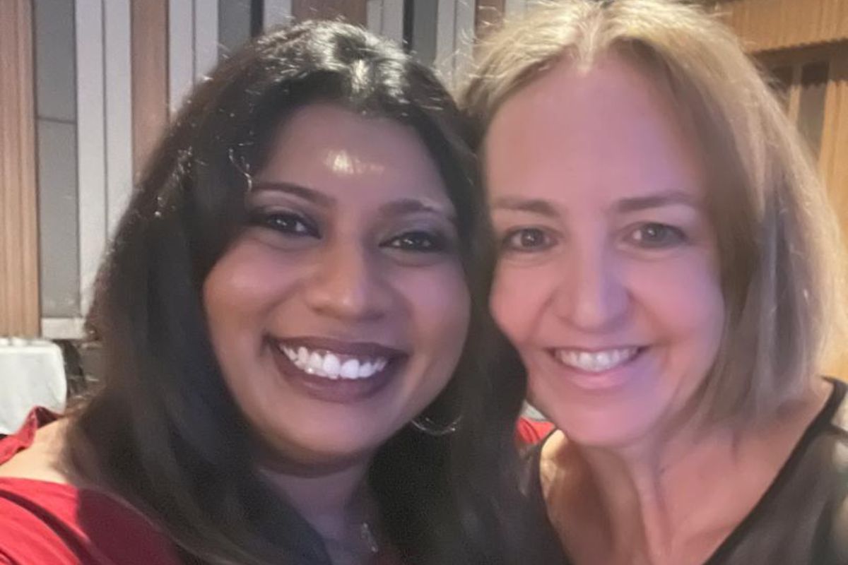 Two female educators, including Dalica Nathan, facilitating early years outdoor activities