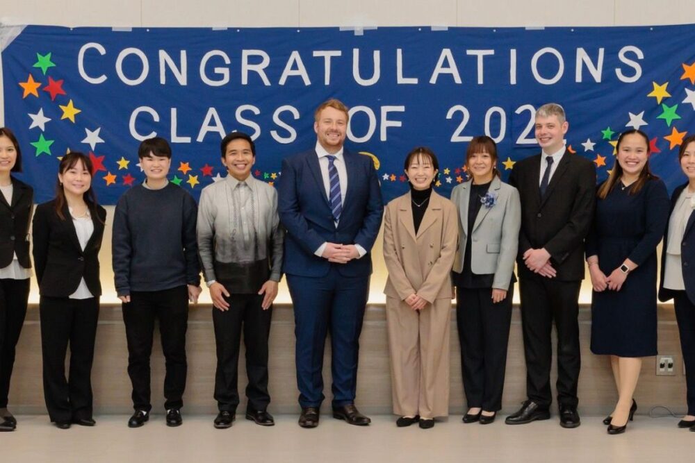 International school staff from diverse backgrounds working together in Japan