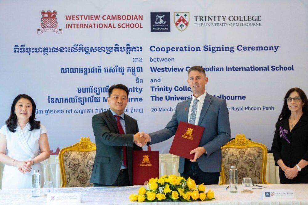 Representatives from Westview Cambodian International School and Trinity College, University of Melbourne, formalise their partnership during the signing ceremony.