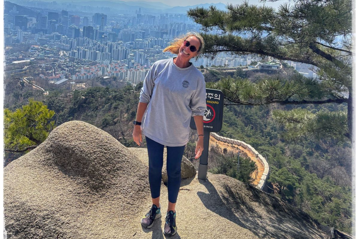 Above the city, Seoul stretches in every direction from the mountain trails above it  
