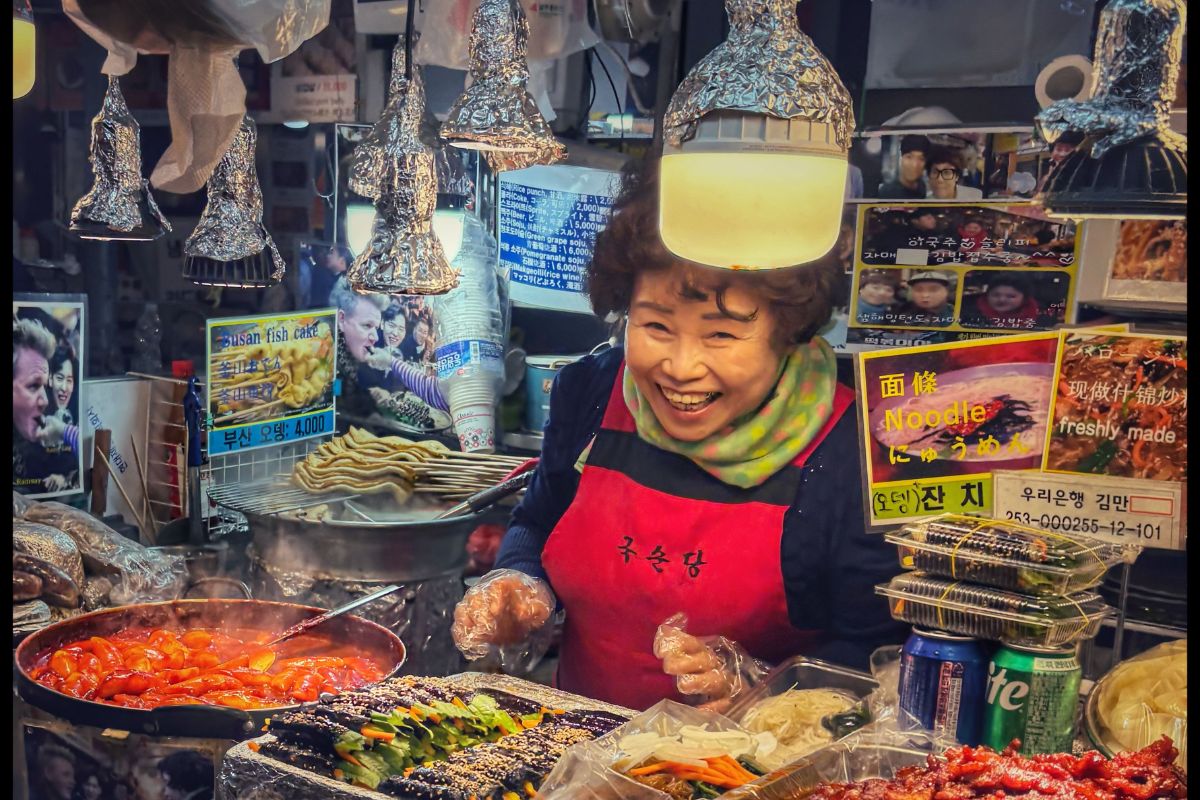 A night market vendor in full flow  