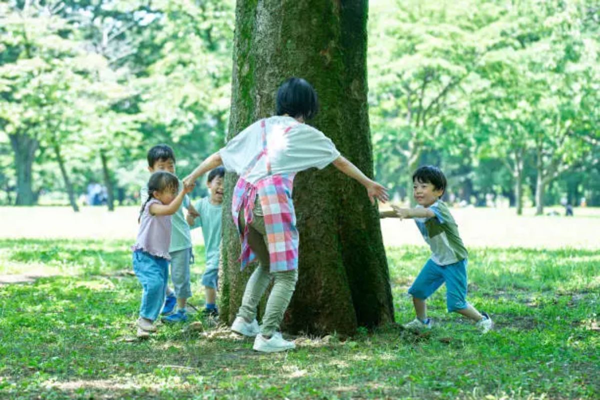 Japanese nursery with children playing under expanded child care access programme government support policy 