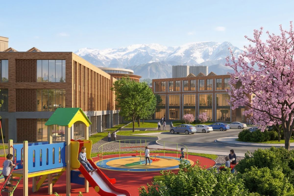 Cherry blossoms in full bloom at Charterhouse Park, with green grass and pathways under a clear sky. 