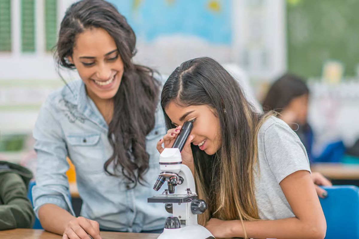 Students engage in hands-on science experiments in modern labs, fostering curiosity, innovation, and real-world learning skills