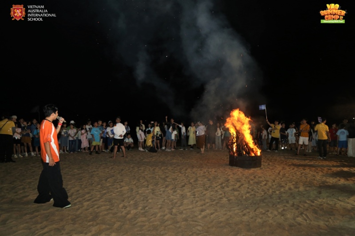 Students enjoy a memorable beach campfire night