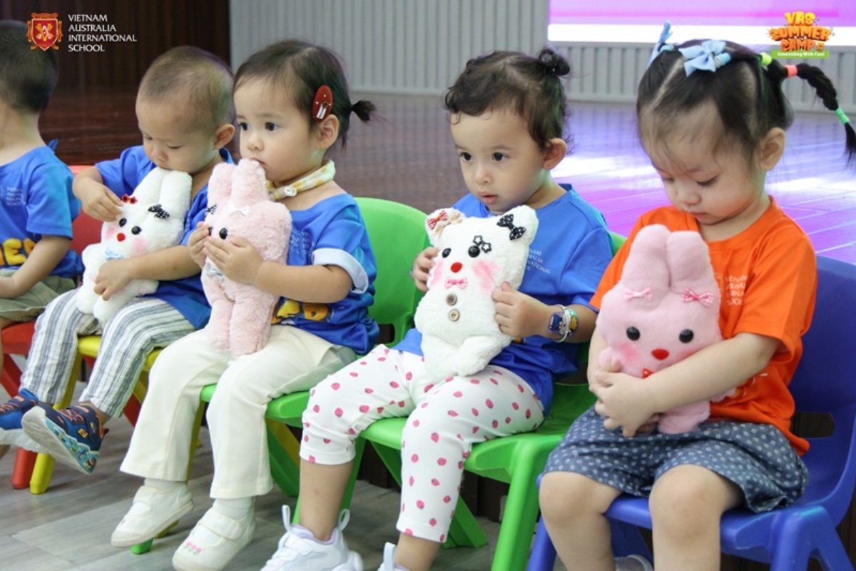 Proudly posing with the cuddly friends they created themselves